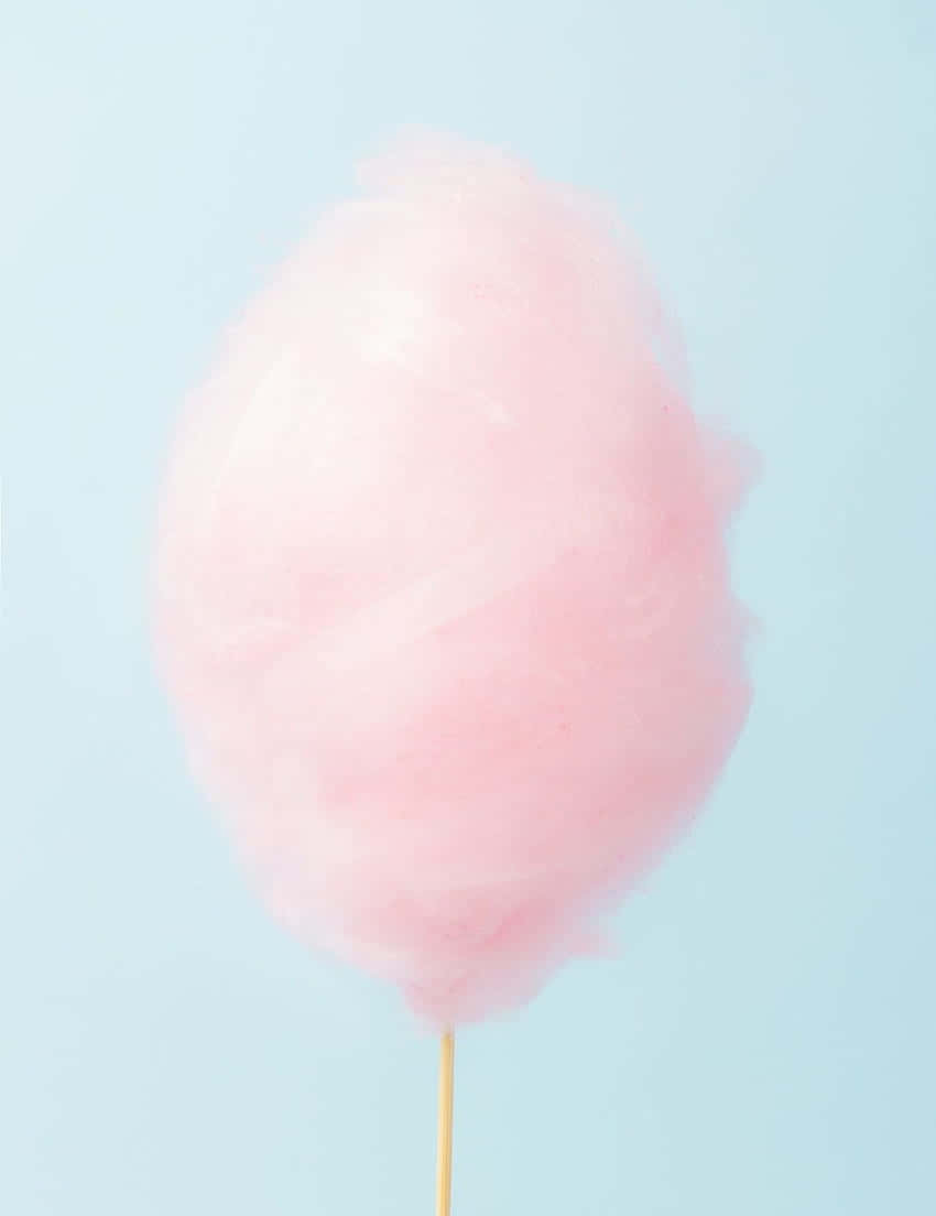 A Pink Cotton Candy On Stick Wallpaper