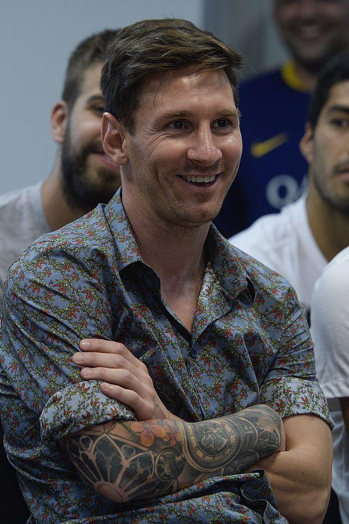 Barcelonas Argentinian forward Lionel Messi smiles during a