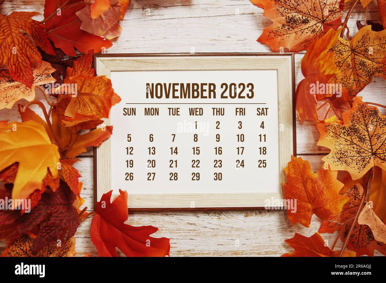 November Monthly Calendar Maple Leaf Decoration On Wooden