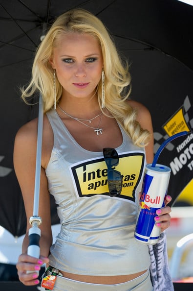  this photo grid girl a grid girl poses on the grid of motogp race of