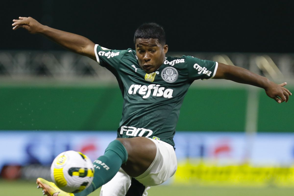 Endrick Felipe kicking a soccer ball during a match for Palmeiras