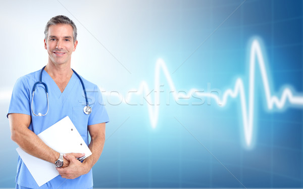 Medical Doctor Cardiologist Over Cardio Background By Kurhan