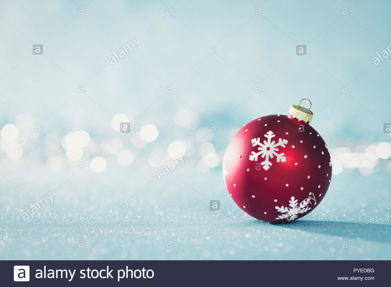Bright Red Christmas Bauble in Winter Wonderland Blue Christmas