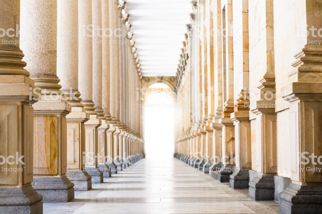 Colonnade Row Of Classical Stone Columns Background With Copy