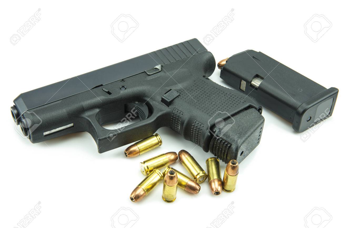Black Gun And 9mm Bullets Isolated A White Background Stock Photo