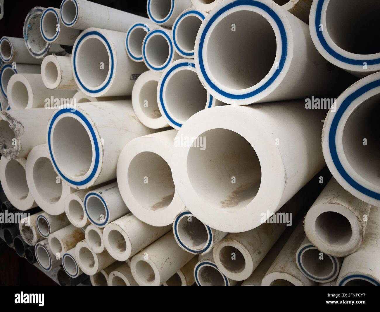 Stack of plastic LDPE water pipes Stock Photo   Alamy