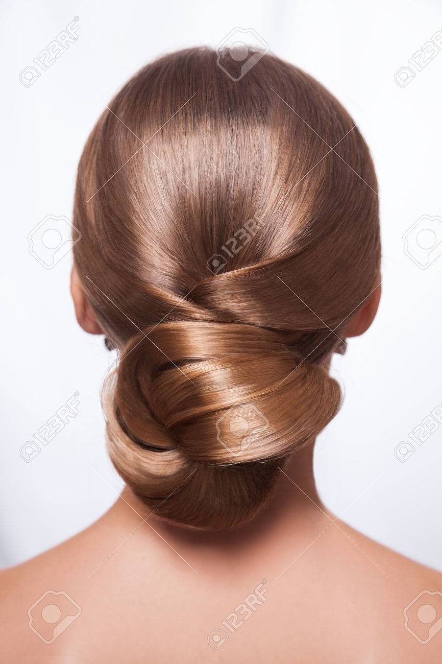 Back Of Beautiful Woman With Creative Elegant Hairstyle
