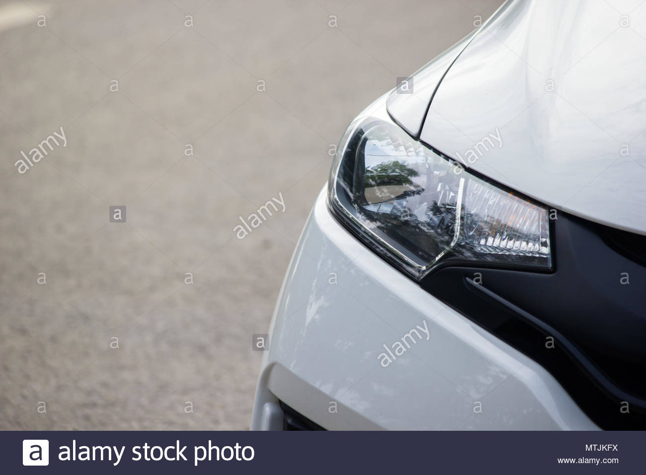 Close Up White Card And Headlight Background With Copy Space Stock