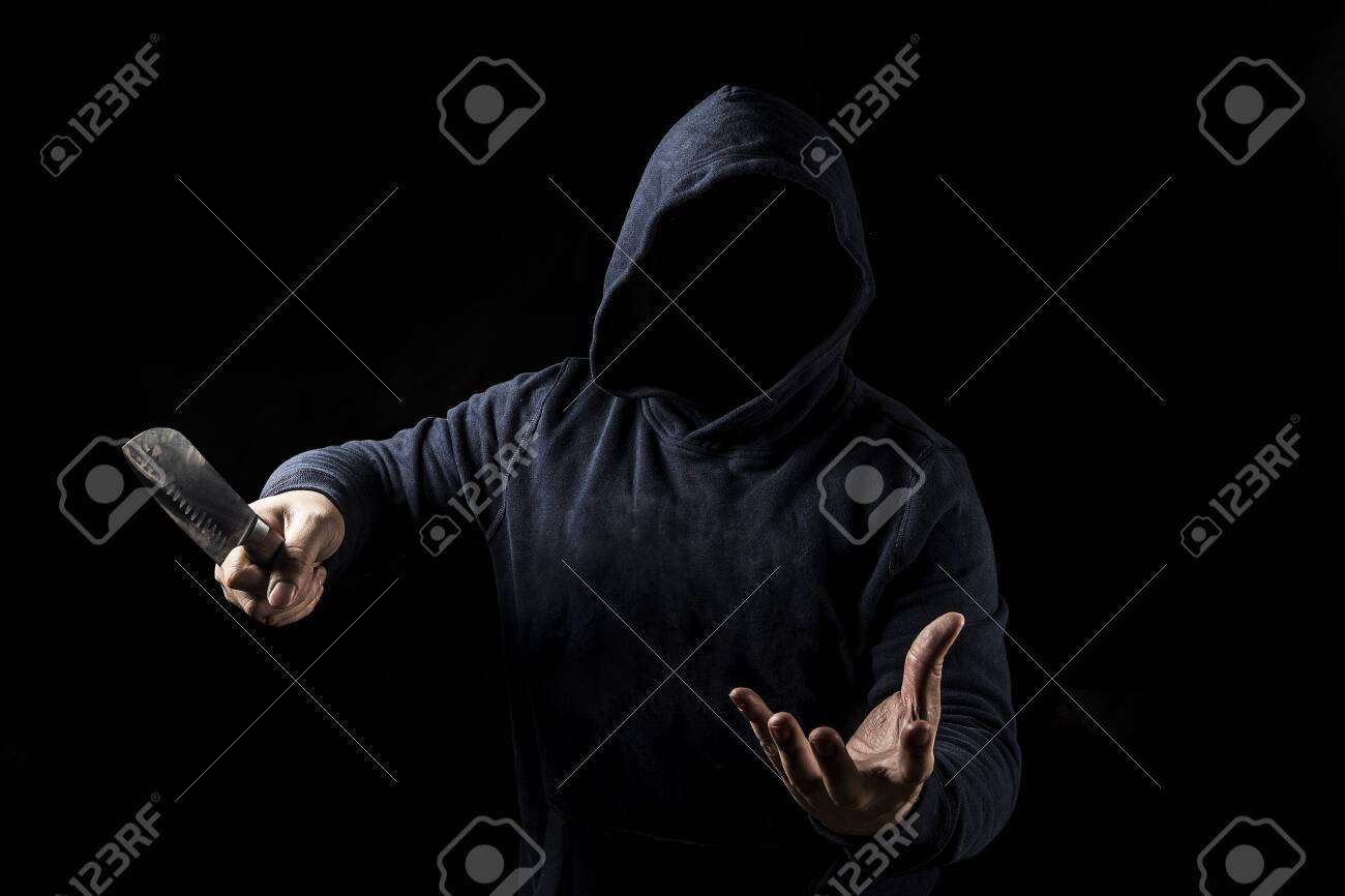 Bandit With Knife On Dark Background Stock Photo Picture And