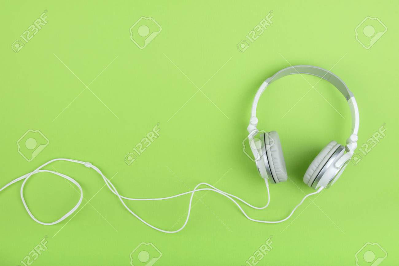 Headphones On Green Background Stock Photo Picture And Royalty