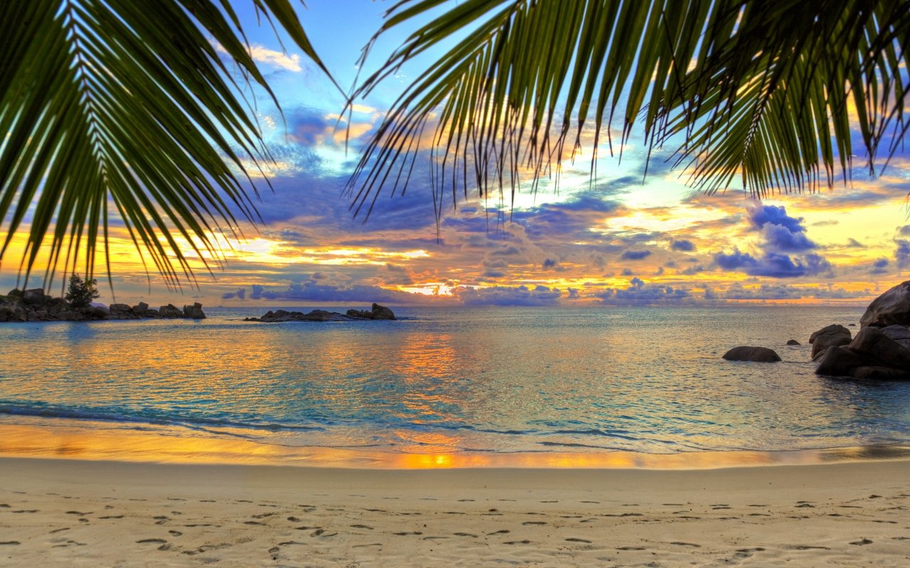 Beautiful sunset in the sky on a tropical beach Desktop wallpapers