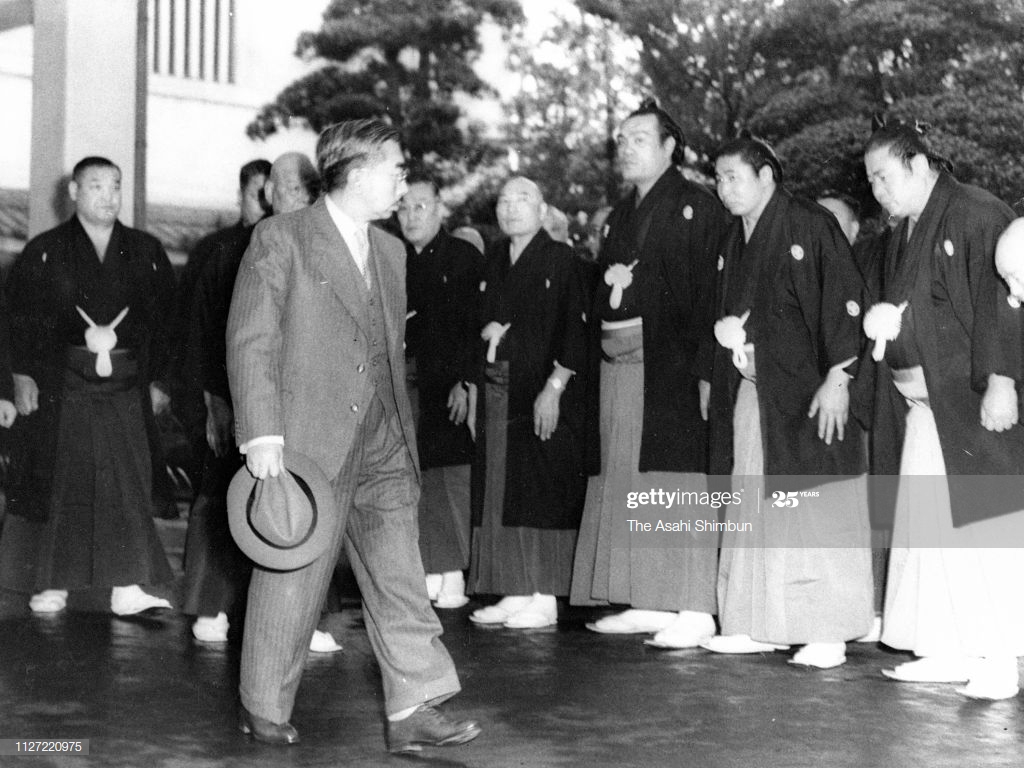 Emperor Hirohito Is Seen On Arrival At Kuramae Kokugikan To Watch