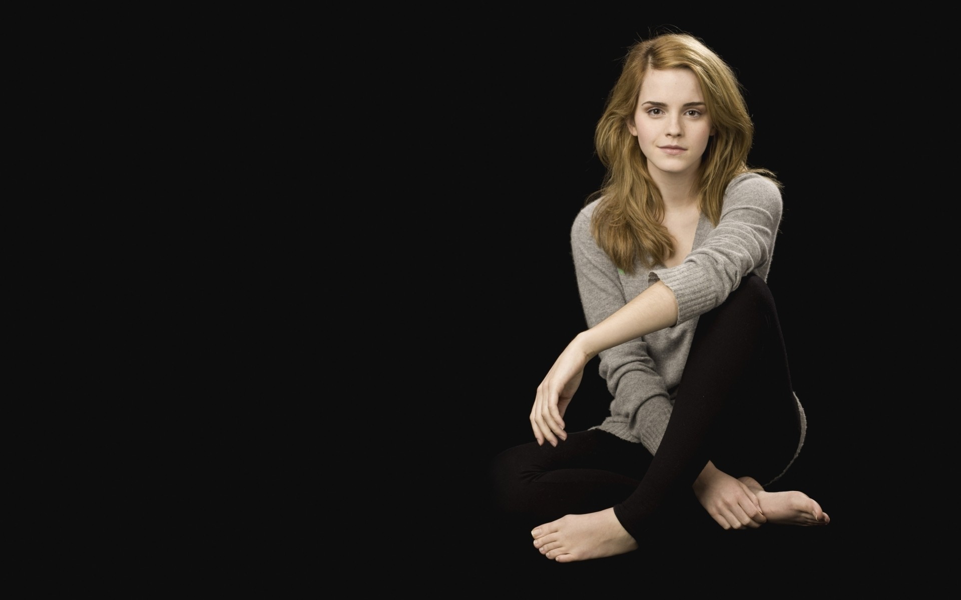 Emma Watson Actress Barefoot Sitting Black Background