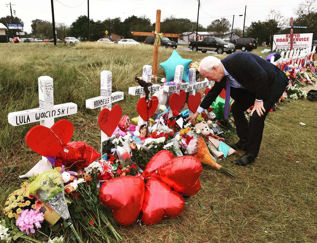 John Cornyn Visiting A Cemetery Wallpaper
