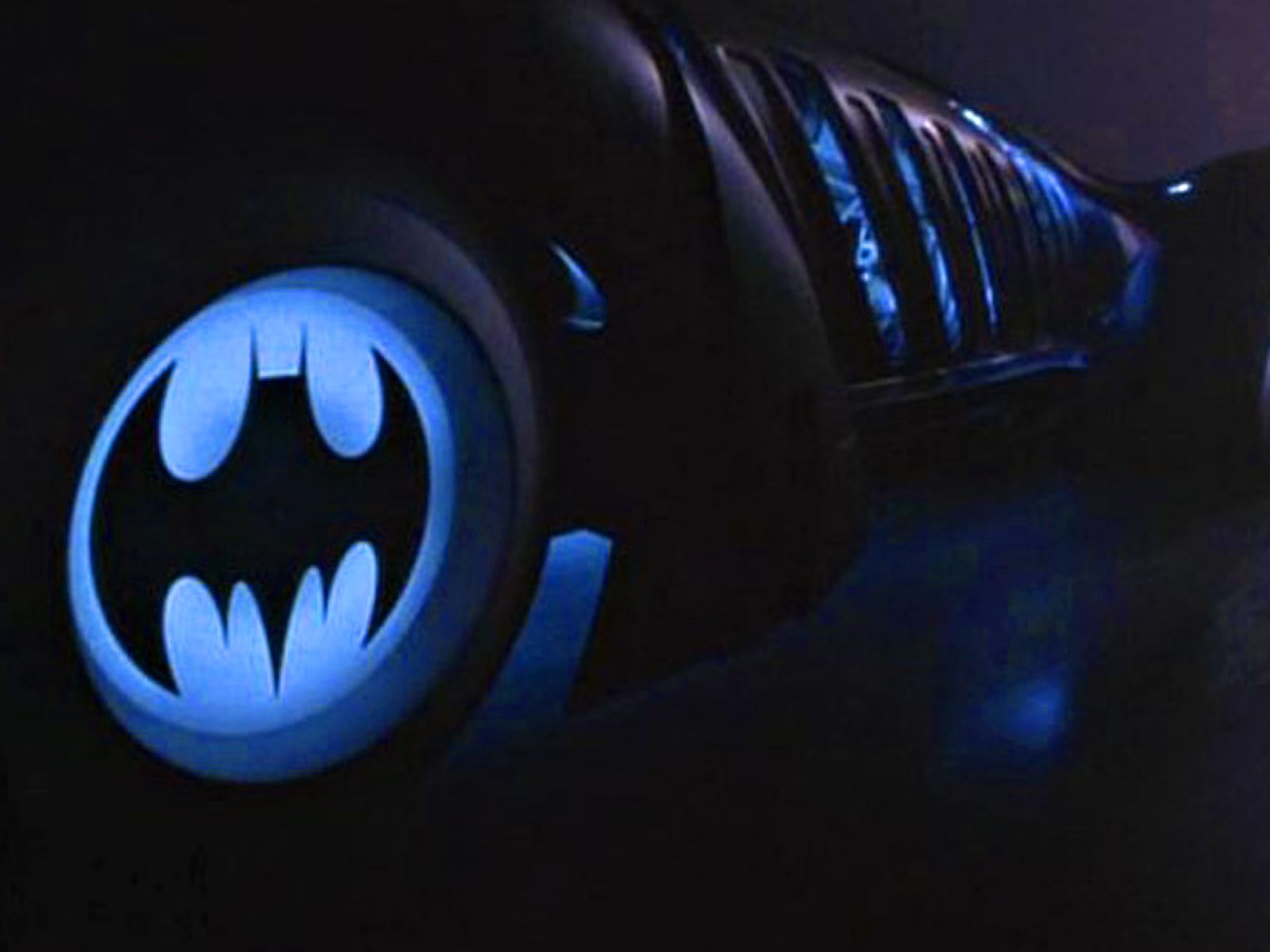 Batman Logo On Batmobile Wheels Wallpaper