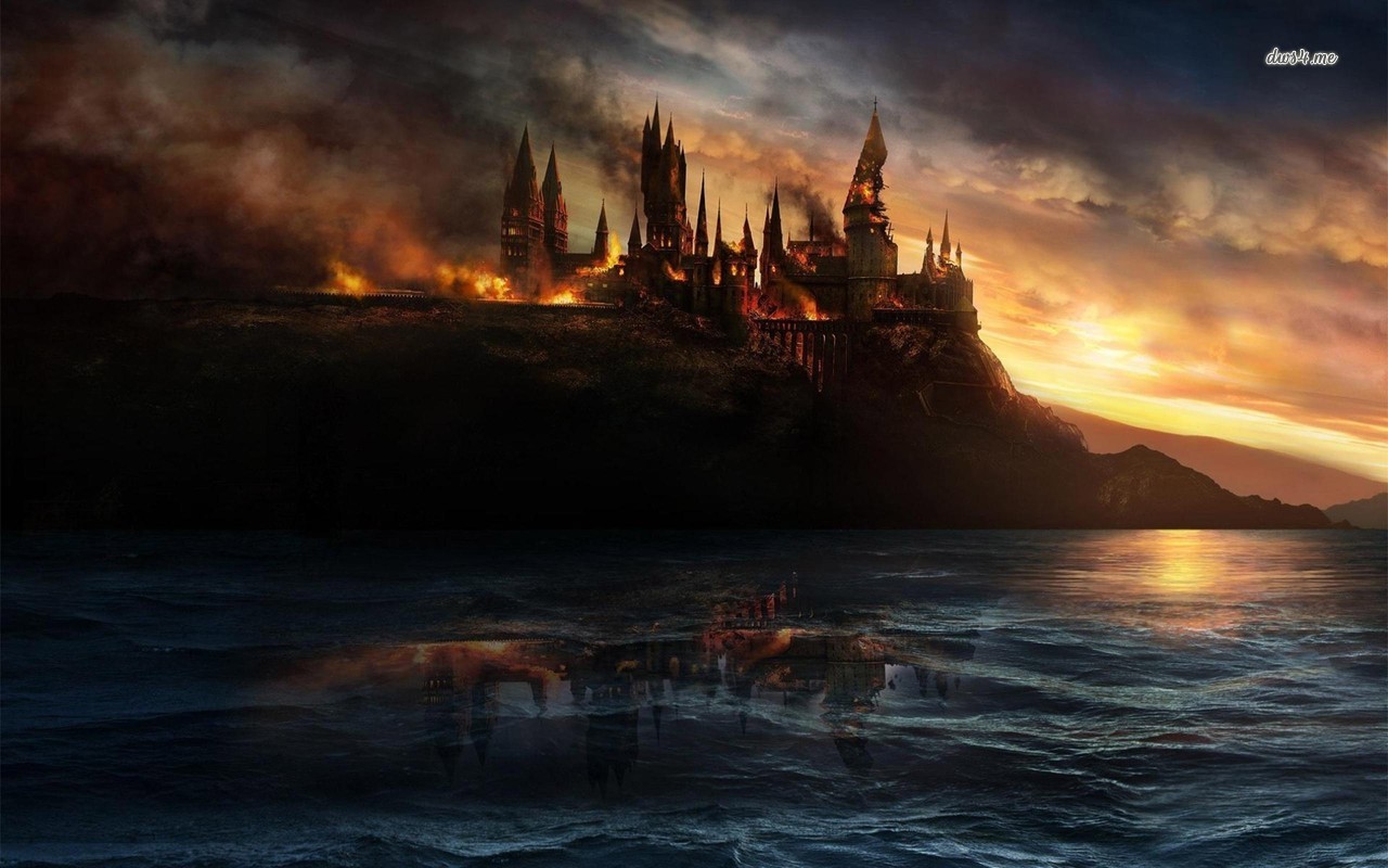 Hogwarts in flames Harry Potter and the Deathly Hallows wallpaper