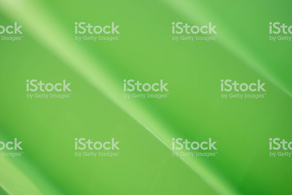 Green Sheet Of Paper Folded Background Stock Photo