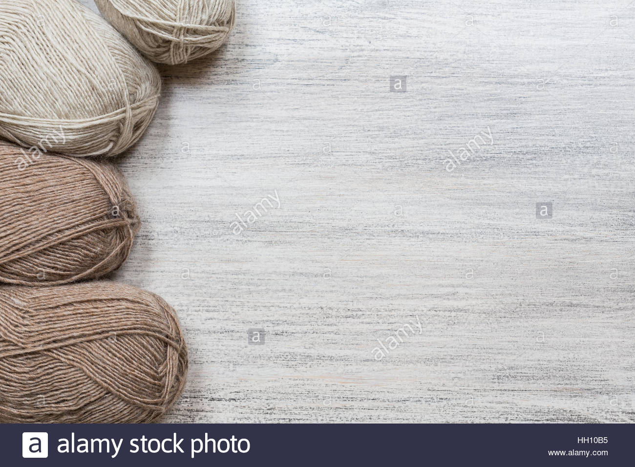 Yarn Skeins On Wooden Background Business Card Stock Photo