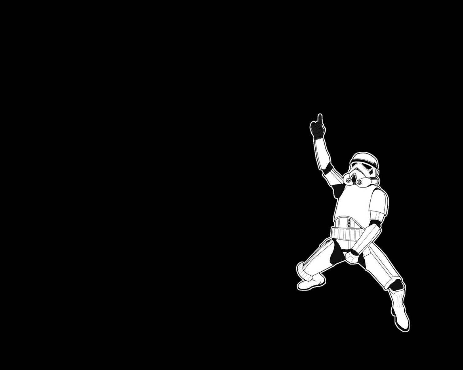 A cool black wallpaper featuring a dancing Stormtrooper from Star Wars
