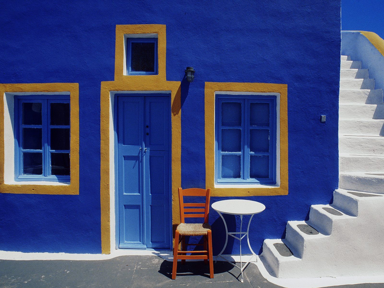 Santorini steps beautiful blue chair door Greece greek house