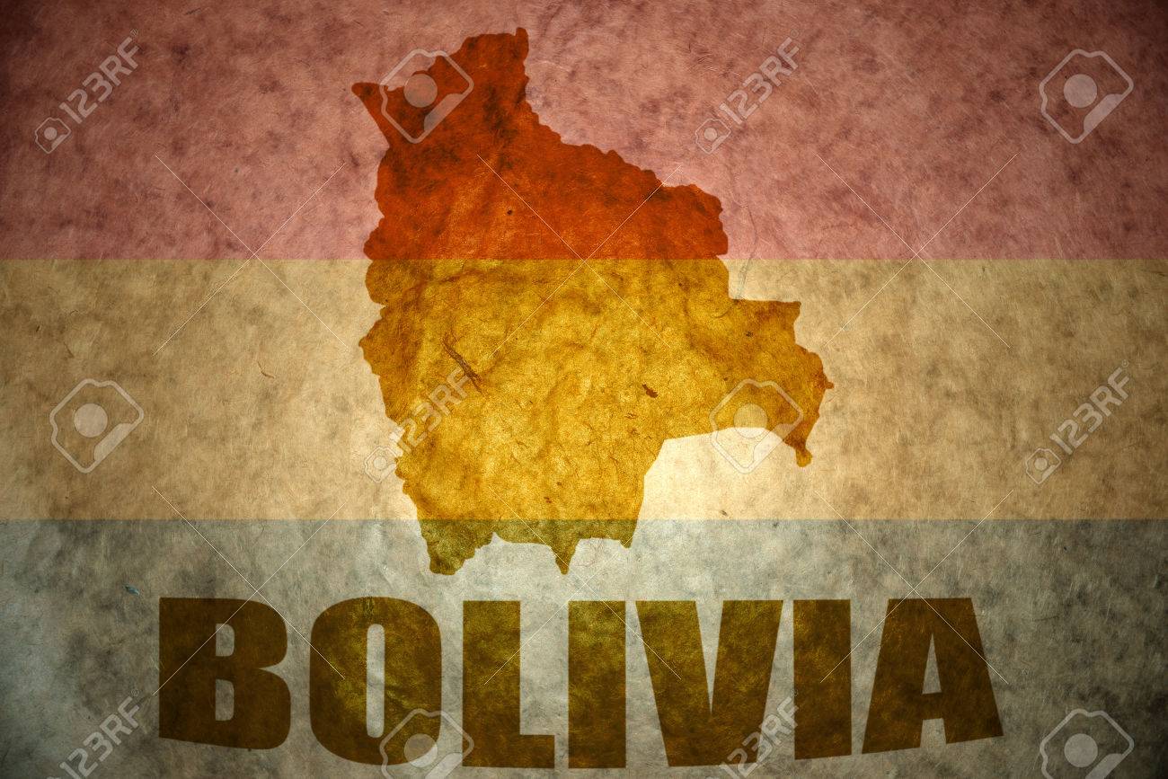 Bolivia Map On A Vintage Bolivian Flag Background Stock Photo