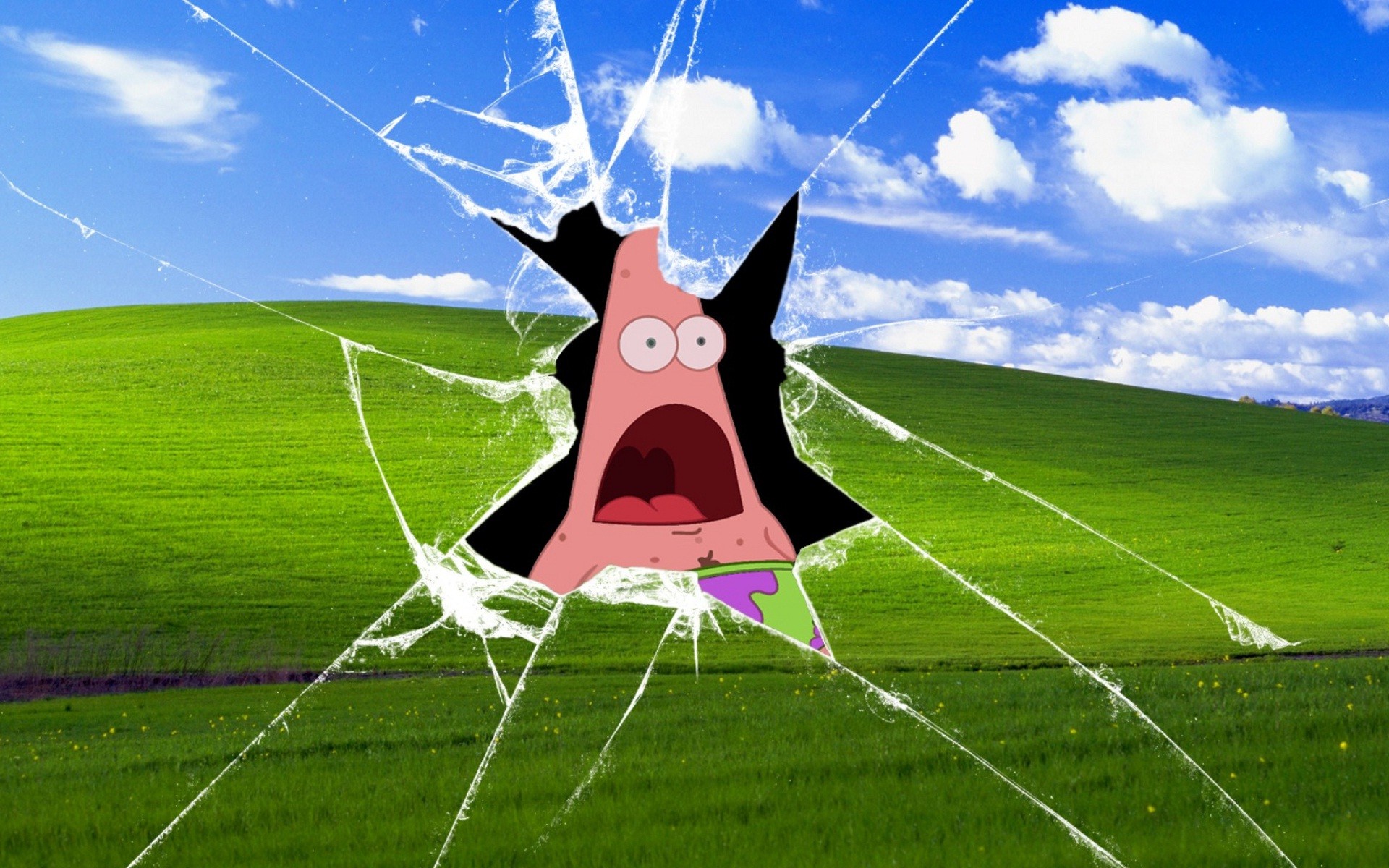 A humorous wallpaper featuring Patrick Star from Spongebob Squarepants bursting through a broken version of the iconic Bliss wallpaper, the default wallpaper of Windows XP
