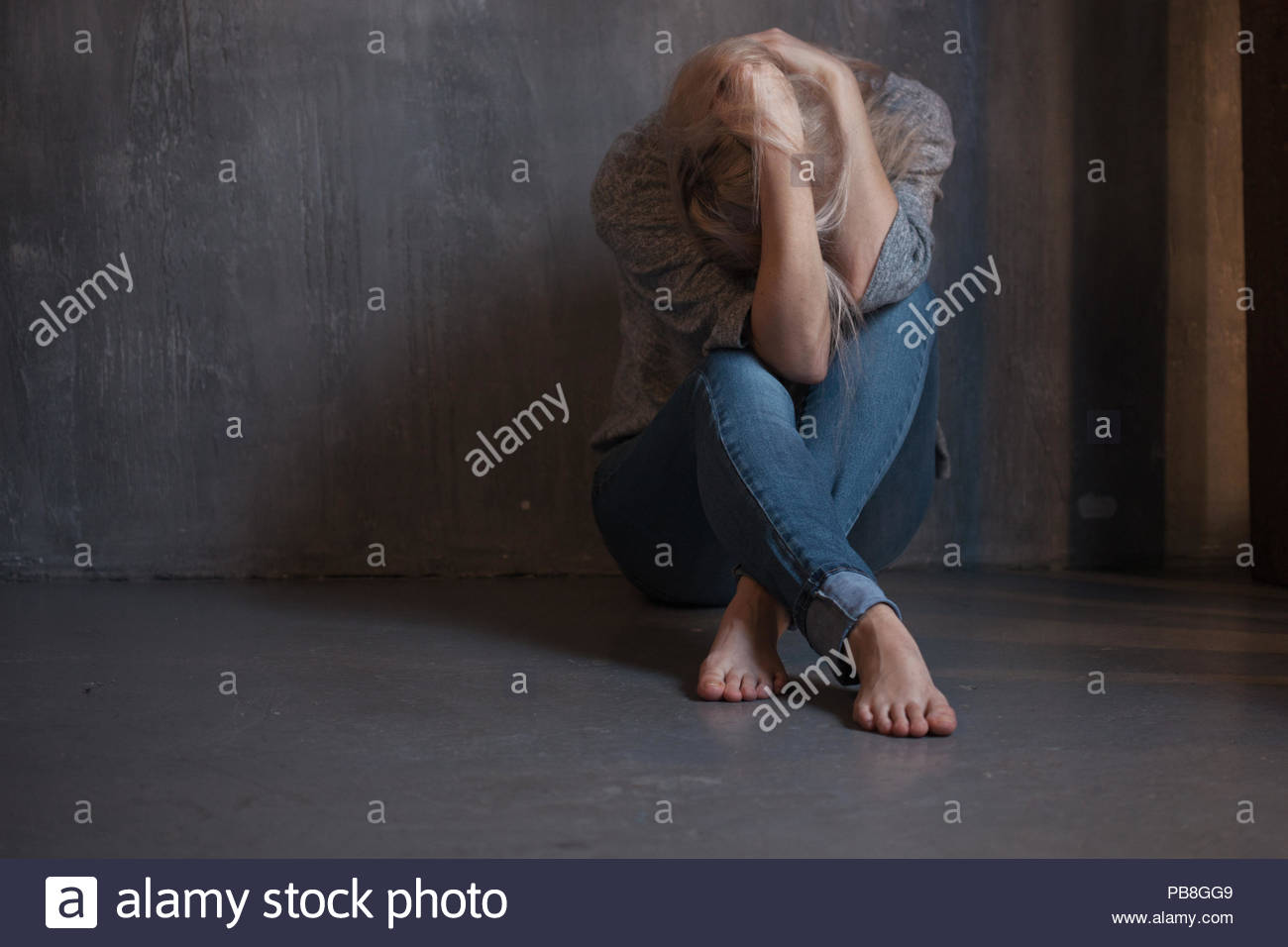 Free download Depression abuse Woman sitting with hands on her head