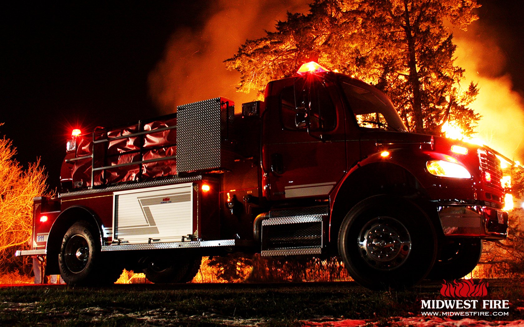 Firetruck at Night Battling Blaze