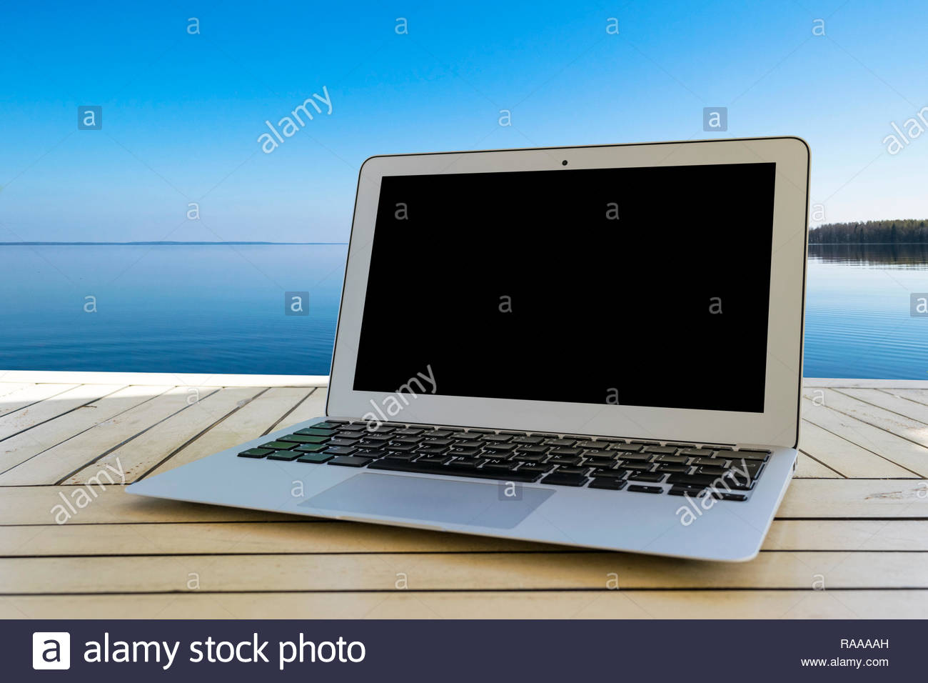 Laptop Puter On Wooden Table Front Ocean Tropical Island