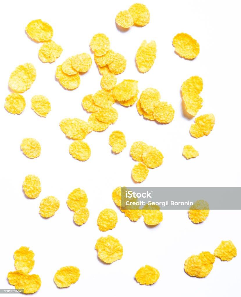 Corn Flakes On White Background Wallpaper For Healthy Food Store