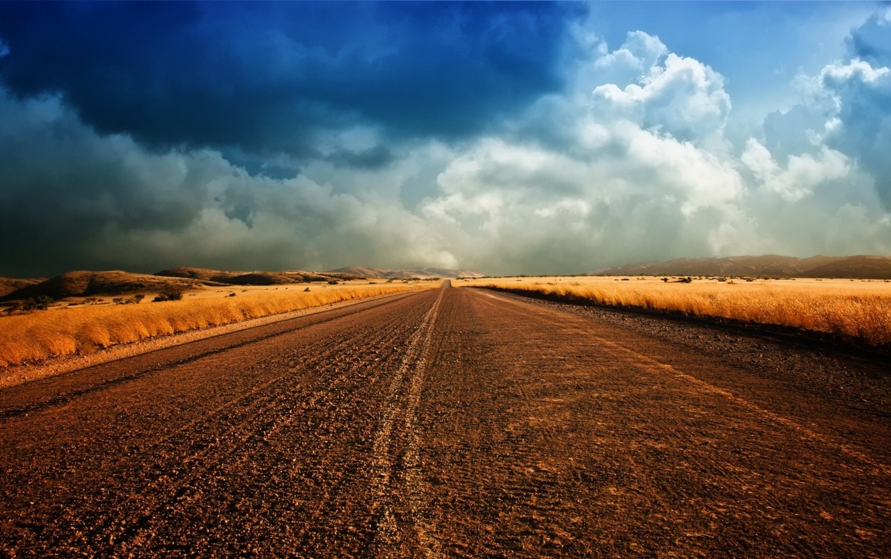 Blue Sky Clouds Country Road Wallpaper And Stock Photos