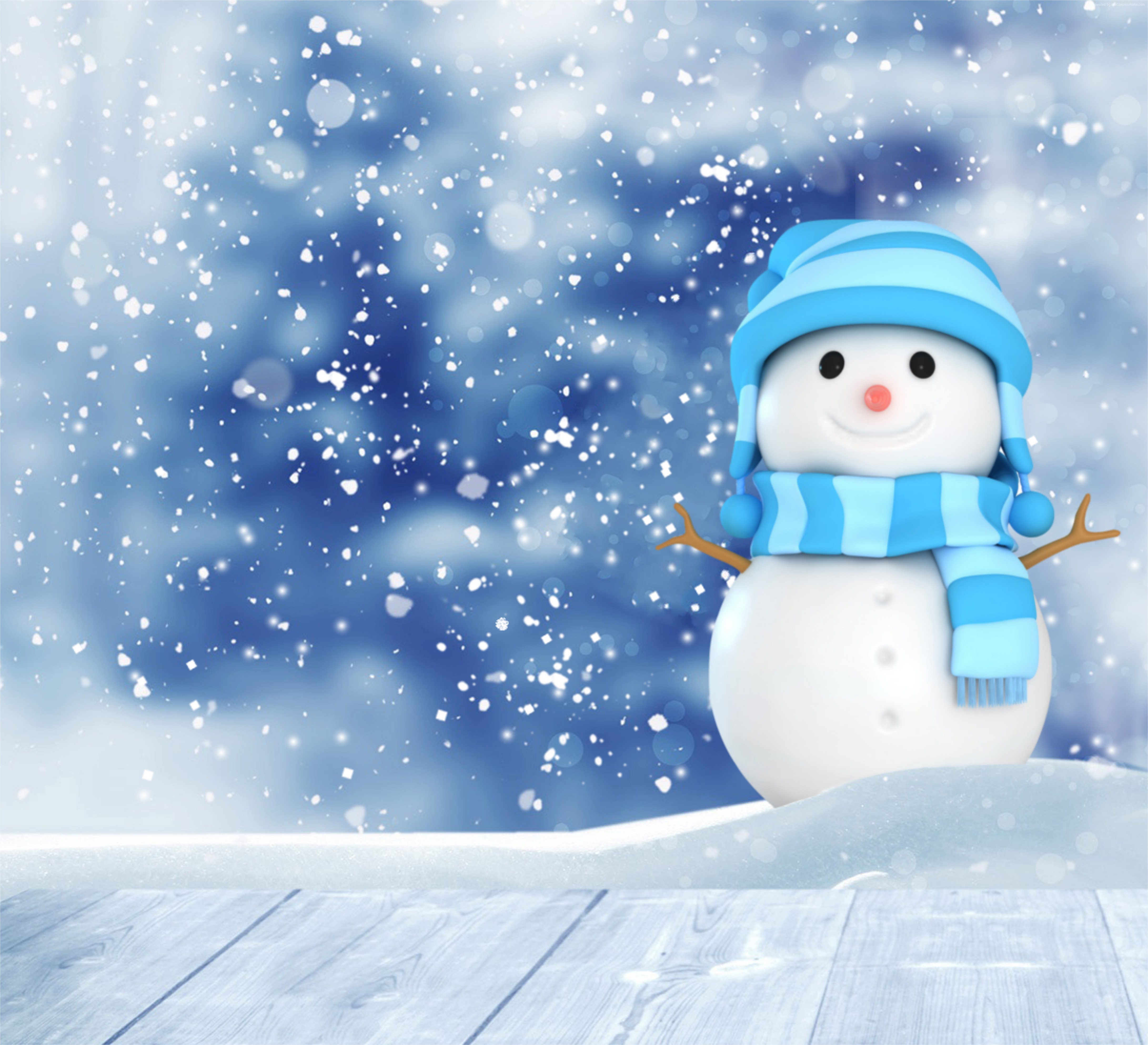 A cheerful snowman with a blue hat and scarf stands in a snowy landscape, perfect for a winter or Christmas scene
