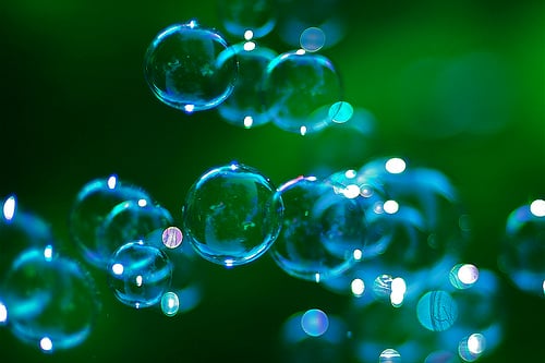floating bubbles green background