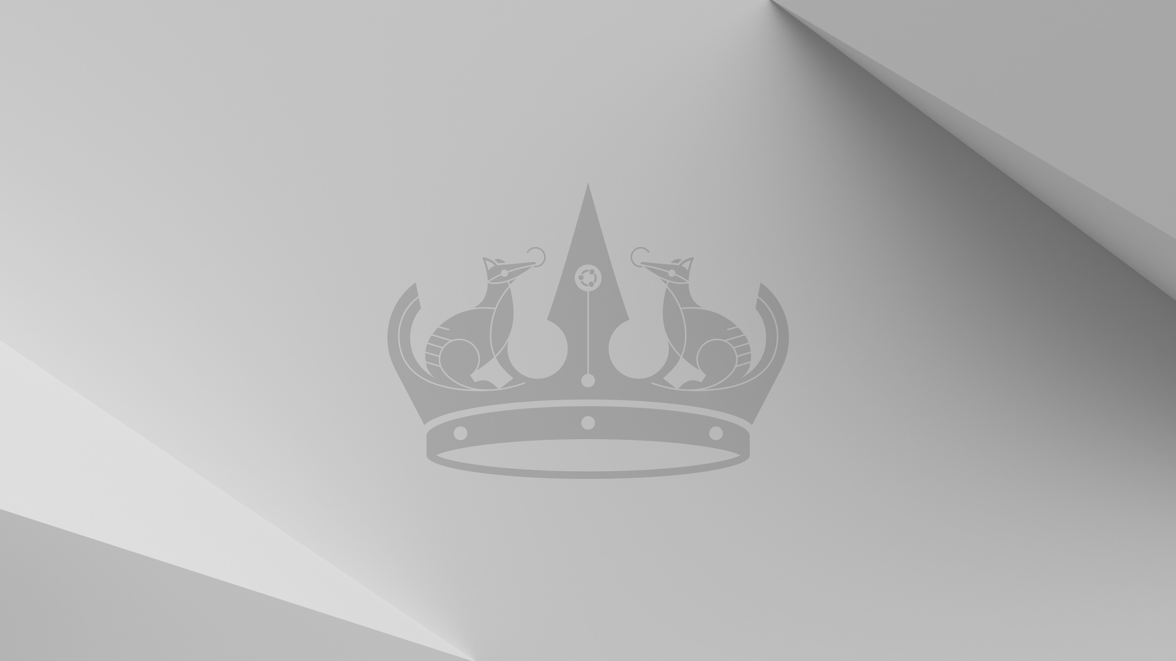 Stylized numbat crown logo on a minimalist gray background