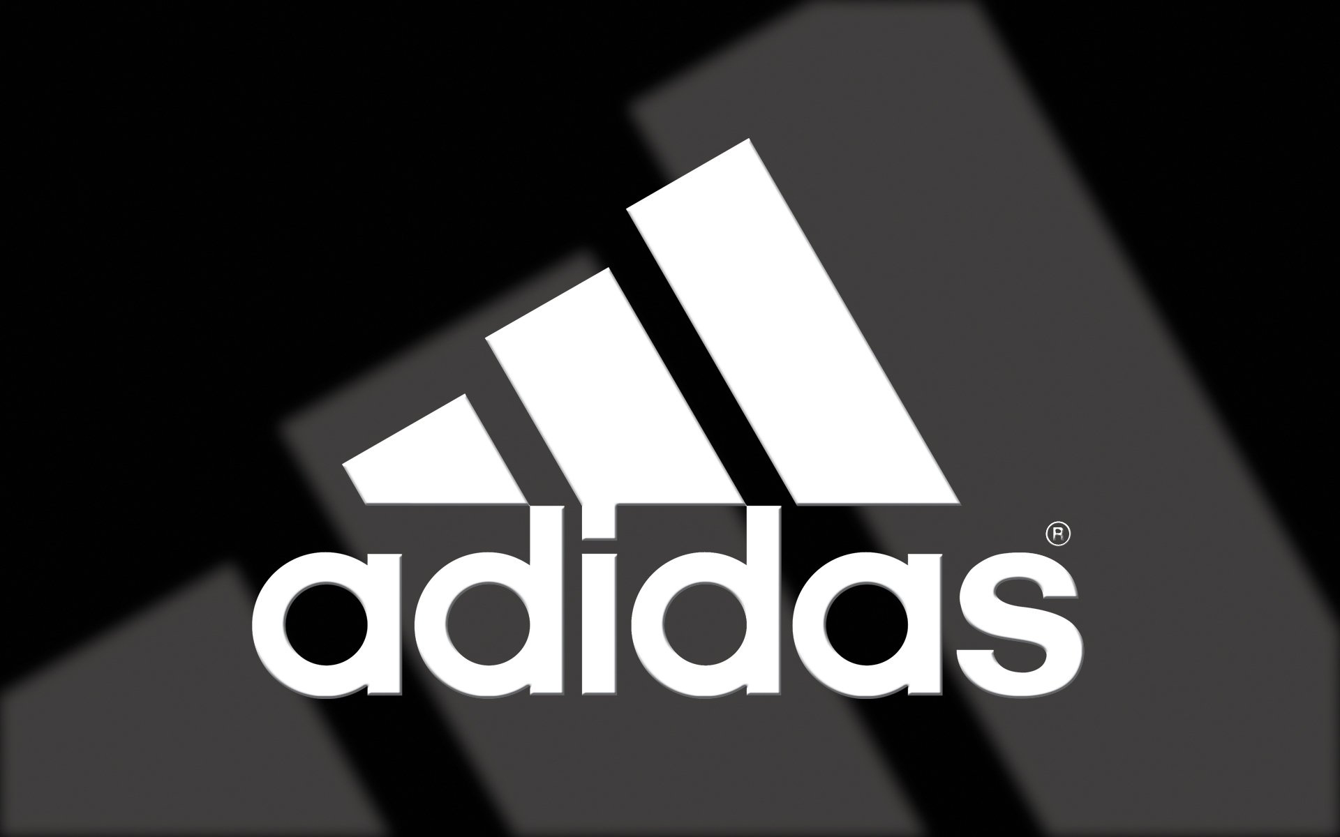 Adidas logo on a black background