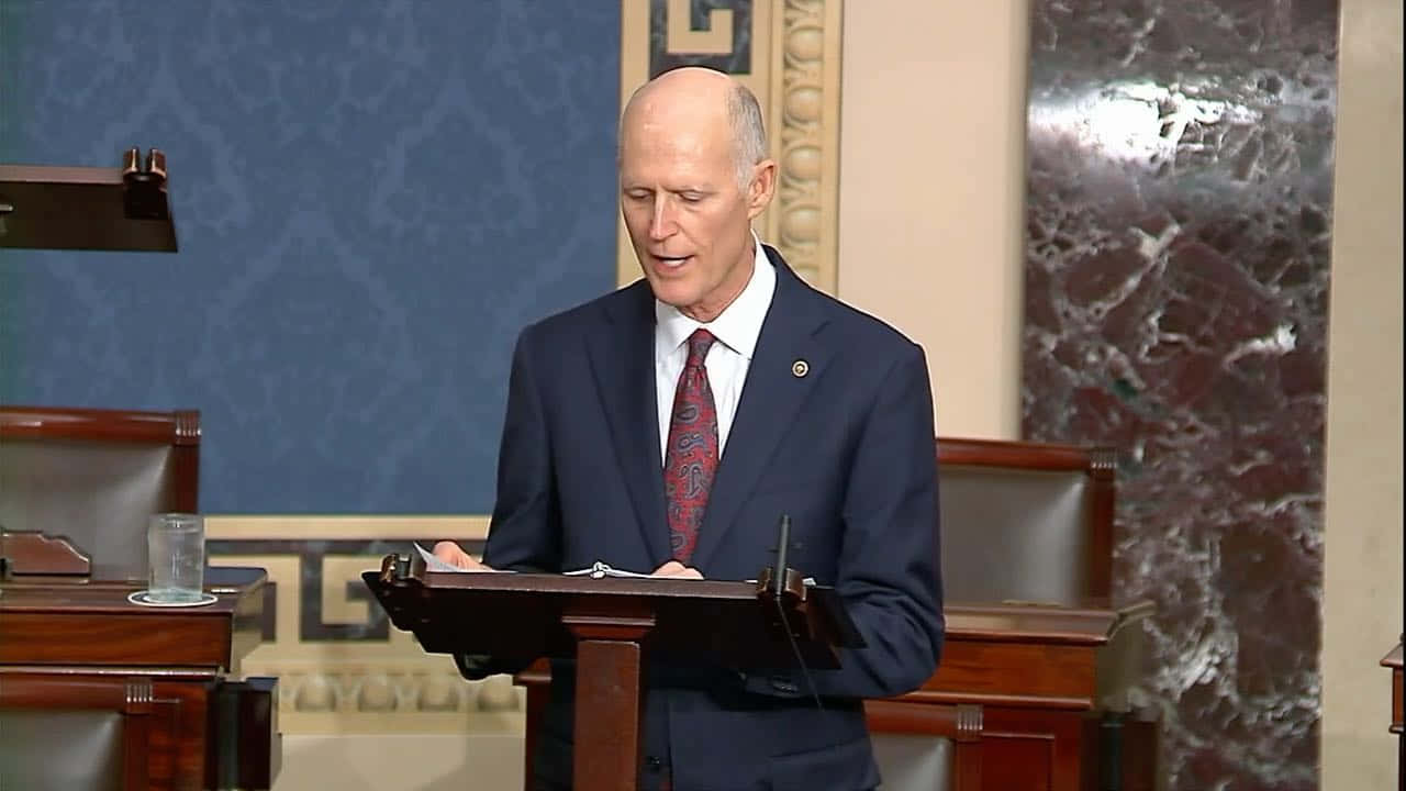 Rick Scott With Various People Wallpaper