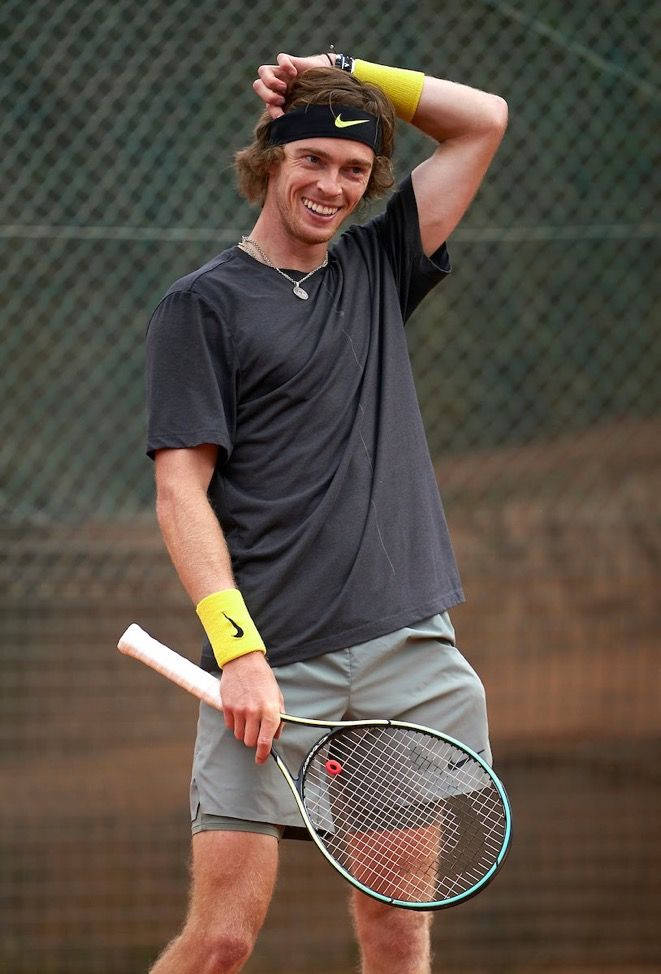 Andrey Rublev With Championship Trophy Wallpaper