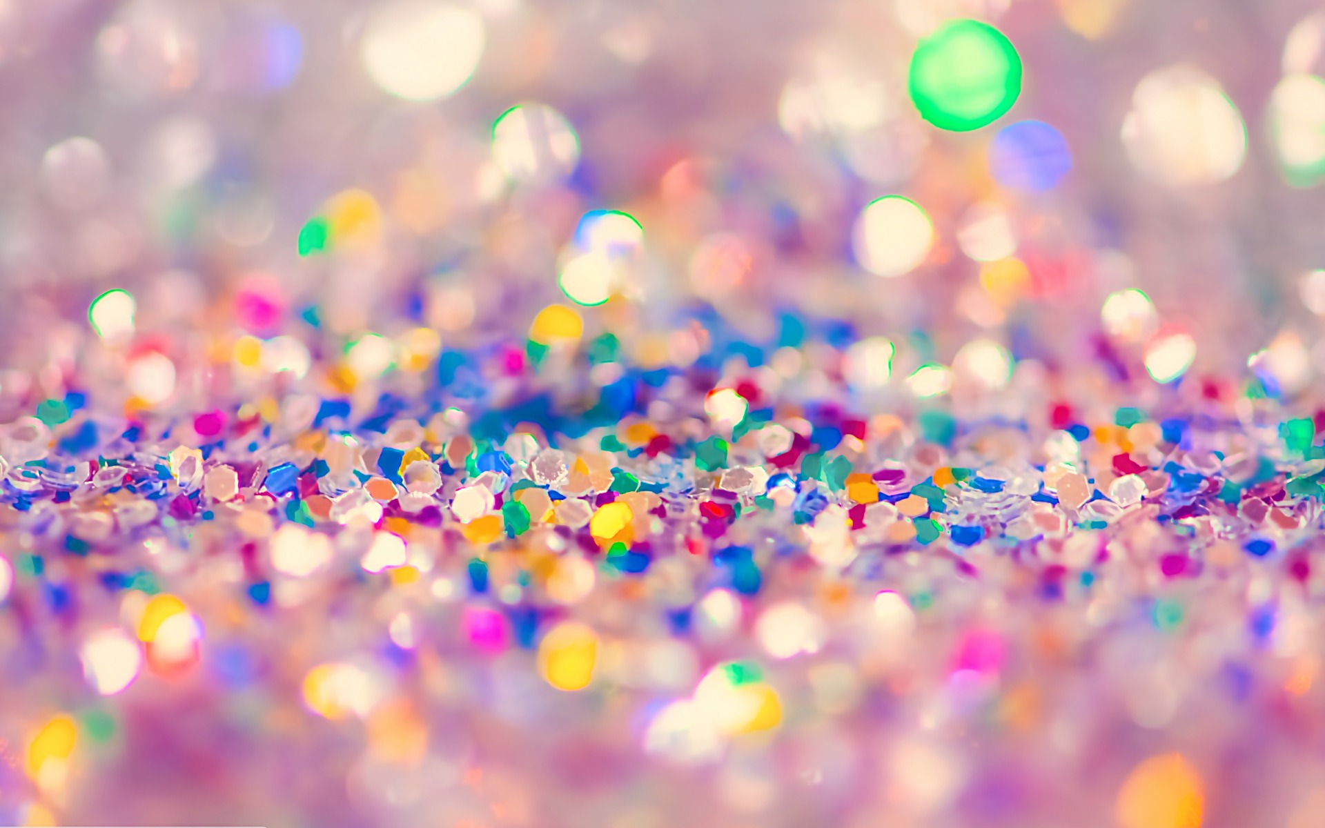 A close-up image of pink glitter, sparkling with a variety of colorful lights. Perfect for adding a touch of sparkle to any design