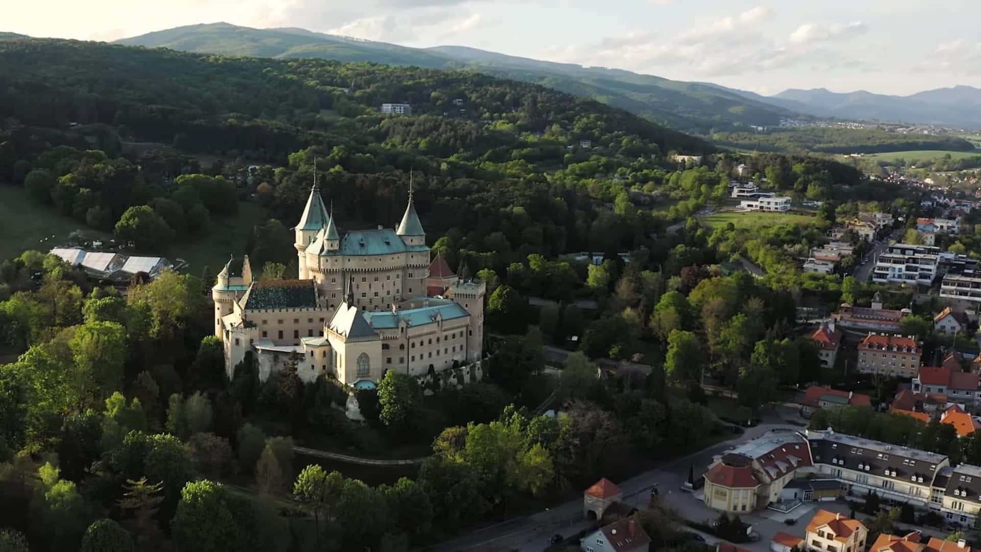 Aerial Bojnice Castle And Forest Wallpaper