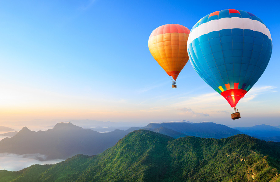 hot air balloons flying over the mountain 4K Ultra HD wallpaper 920x600