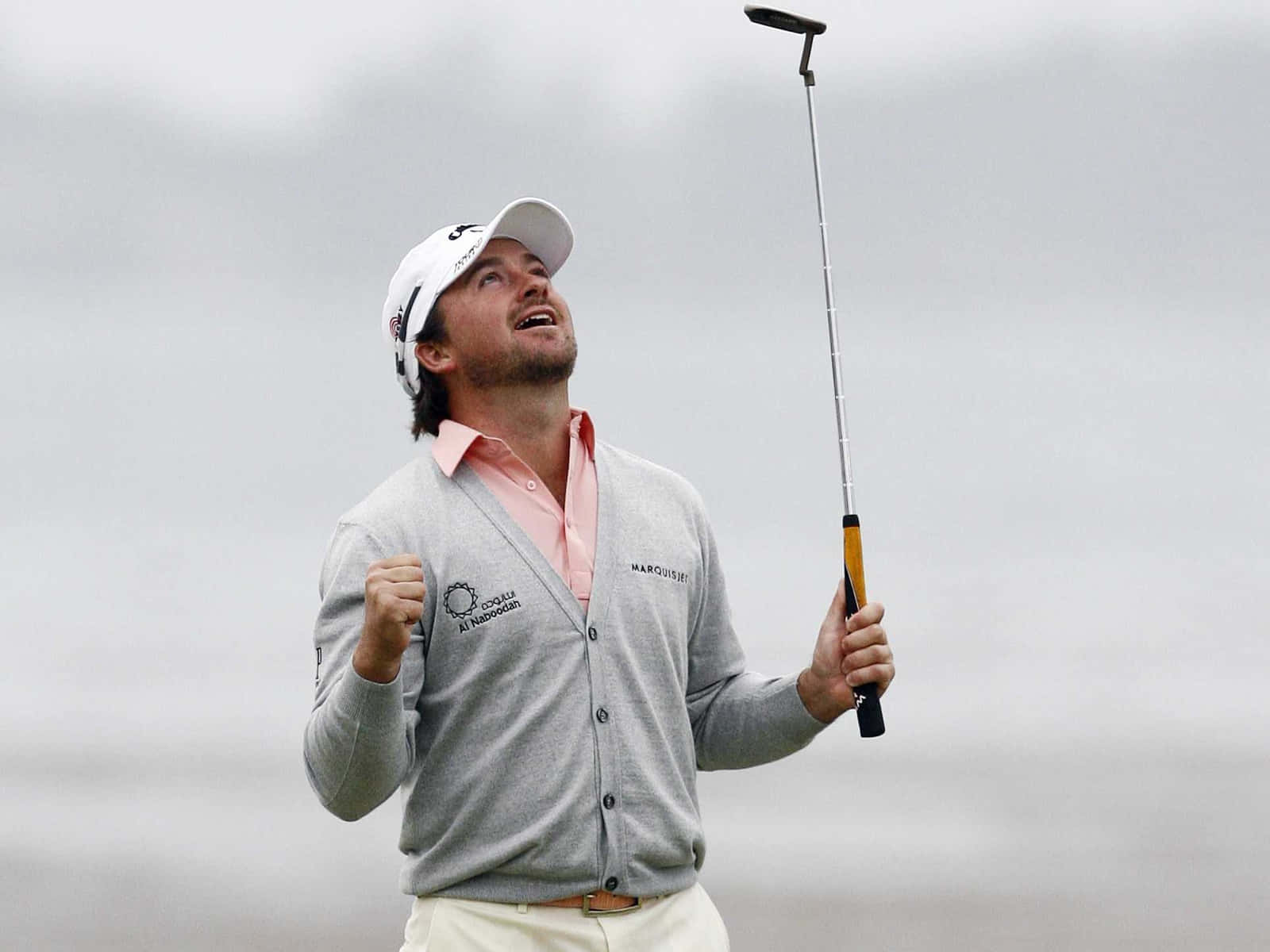 Loren Roberts Swinging With Precision On The Golf Course Wallpaper