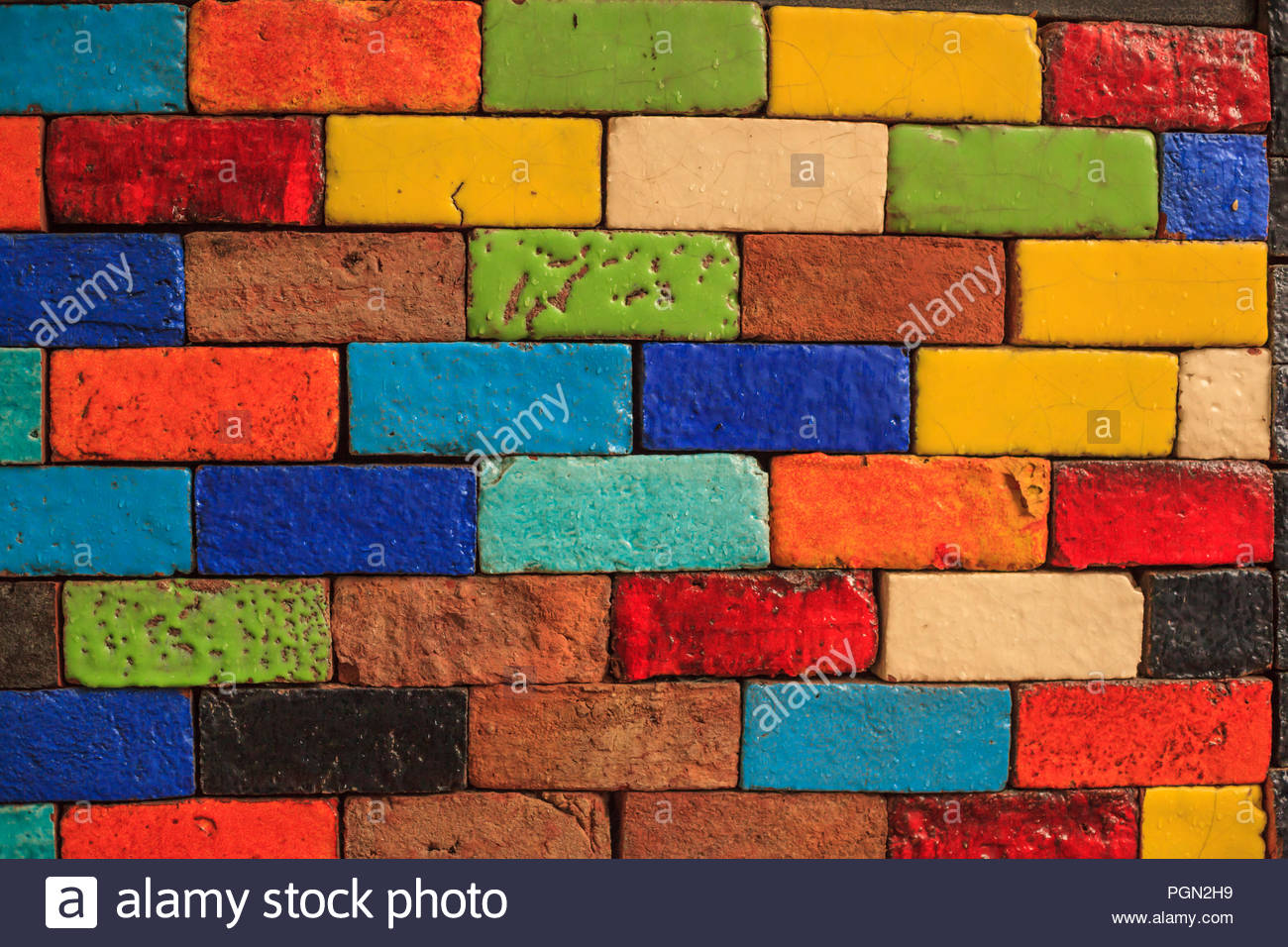 Abstract Aged Multicolored Painted Baked Earthen Clay Brick Blocks