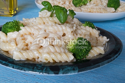Pasta On Plate Blue Wooden Background Foto De Stock Thinkstock