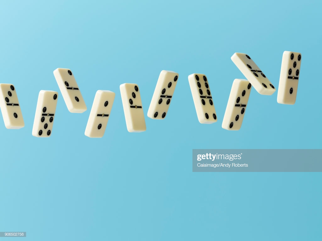 Floating Dominos On Blue Background High Res Stock Photo   Getty
