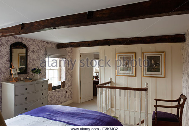 Attic Bedroom With Asticou Wallpaper By Nina Campbell Stock Image