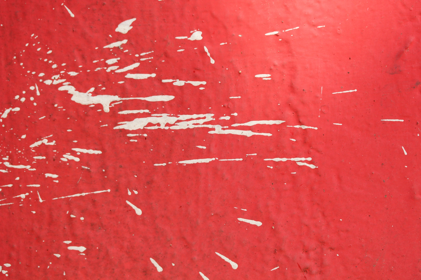 Paint Splash On A Red Wall Background Links Image
