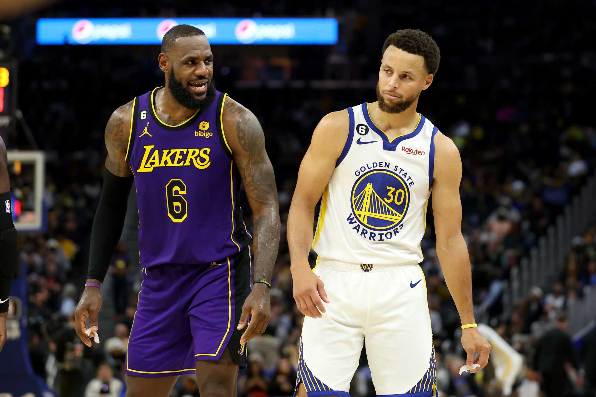 LeBron James and Stephen Curry face off during an NBA game