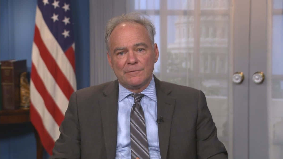 Influential Figure Tim Kaine In A Professional Gray Suit Wallpaper