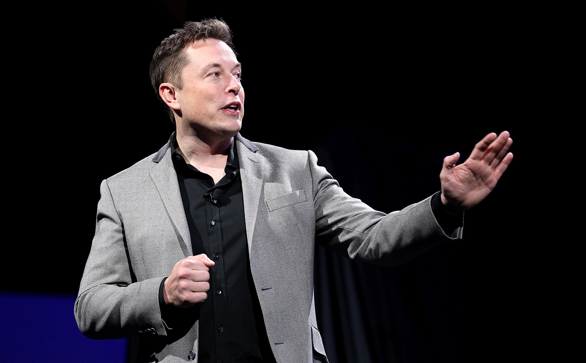 Elon Musk speaking at an event