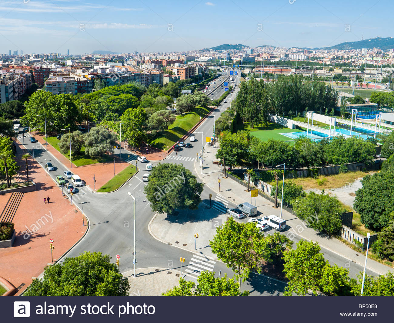 Aerial Of Barcelona Spain With Highway And City In Background